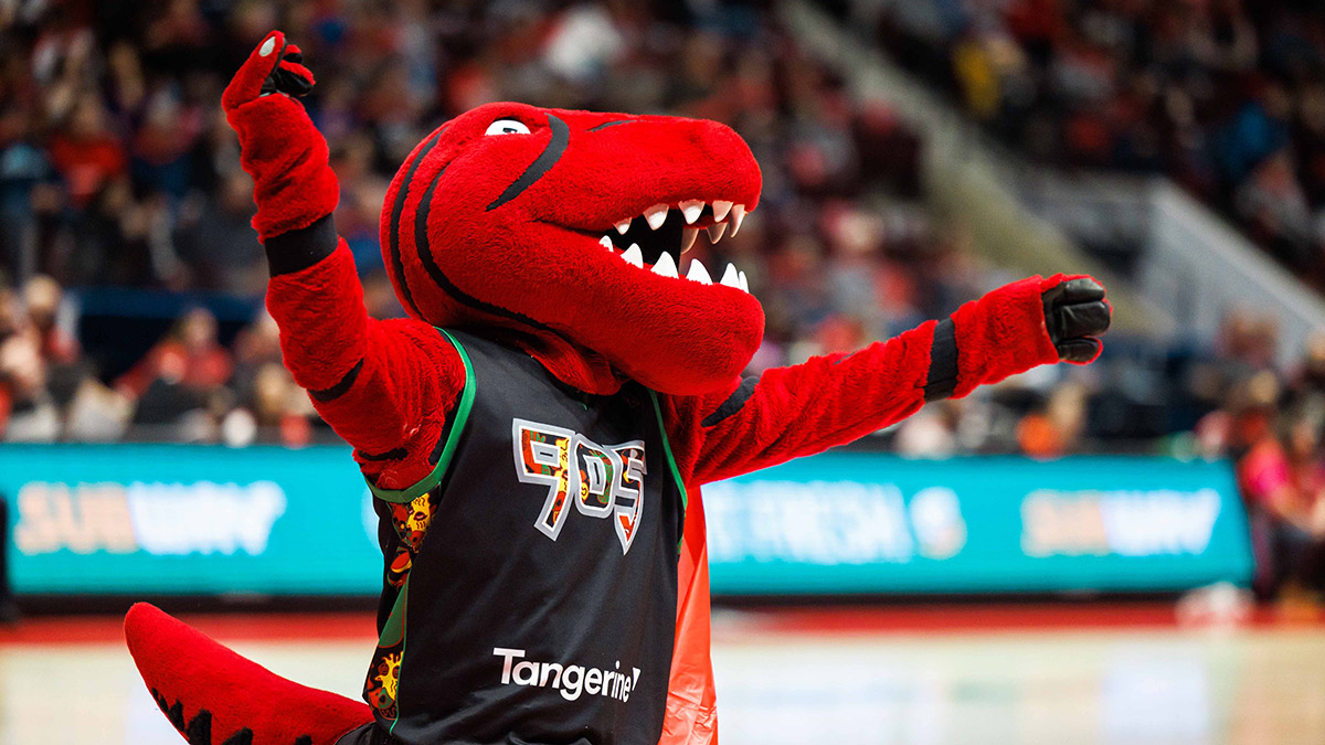 The Raptors mascot waving at the crowd.