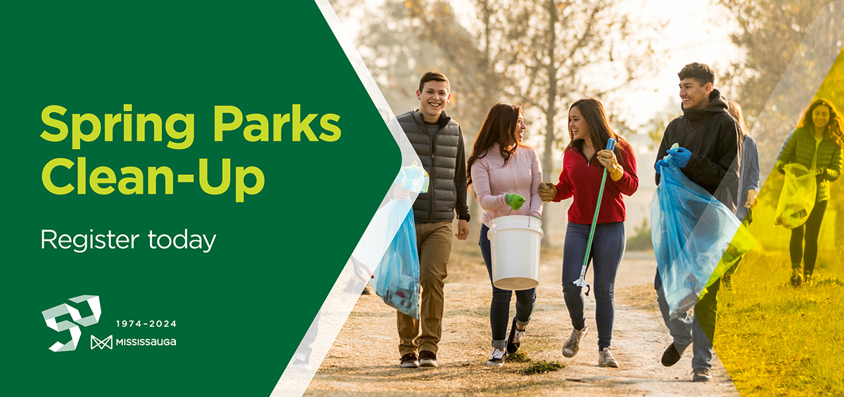 A group of people cleaning up a park.