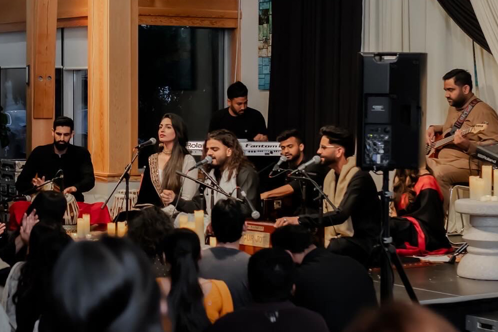 RAAHI group playing an indoor concert