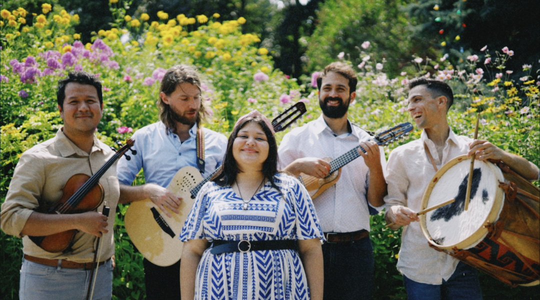 El Ceibo holding their musical instruments