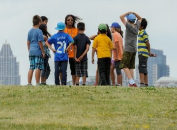 A group of children playing in the park.