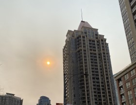 A hazy sun in a Mississauga downtown.