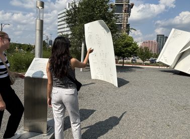 Tourists visiting one of Mississauga's many interesting attractions - giant books!