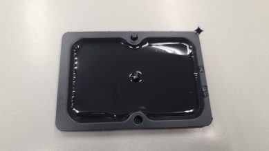 A black glue trap to capture wildlife like rats