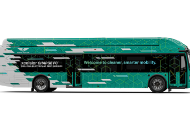 A green and white hydrogen fuel cell electric bus with 