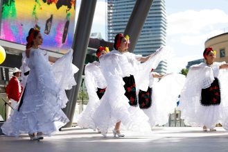 Dancers on stage at Mississauga Latin Festival 