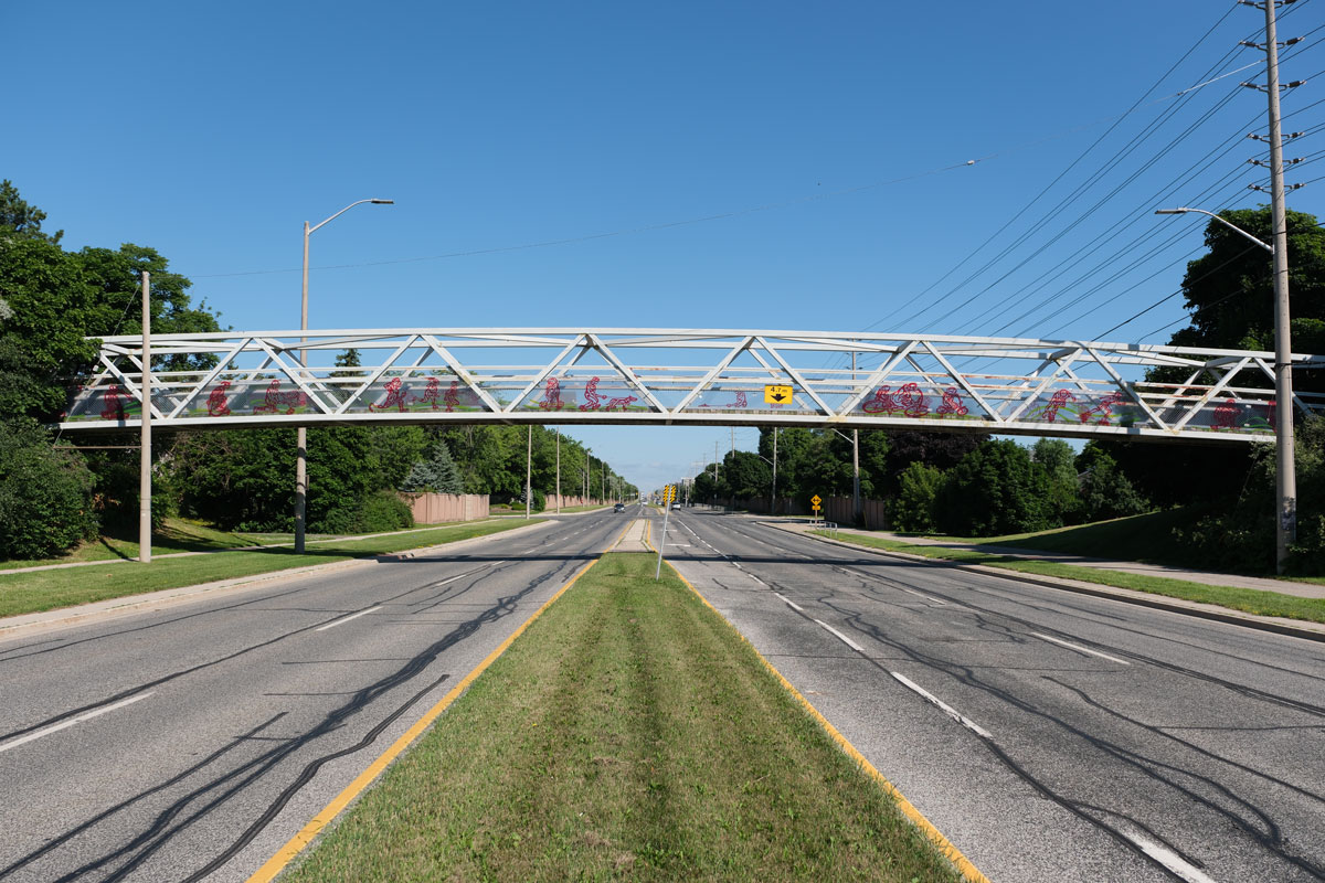 The pedestrian bridge at Winston Churchill Boulevard, north of Britannia Road West 
