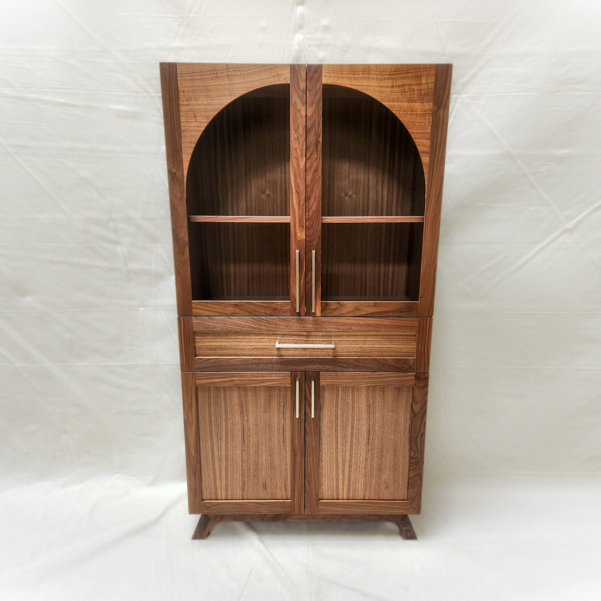 A wood cabinet against a white background.